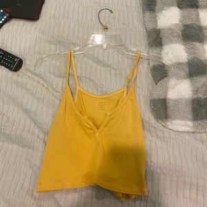 yellow tank top